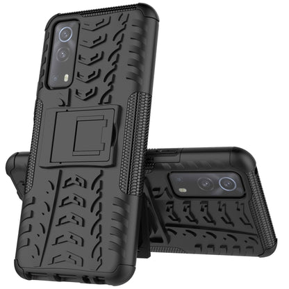 Black rugged phone case with textured grip and built-in holder for phone