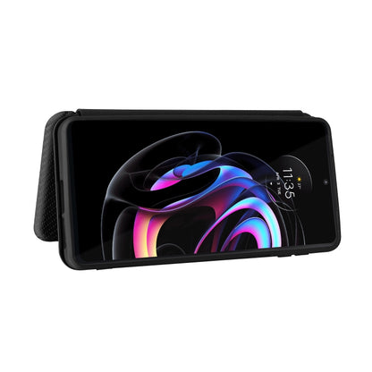 Black carbon-fiber magnetic flip case protecting a phone screen