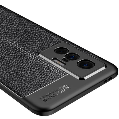 Black litchi-texture TPU case close-up of triple-camera opening and buttons