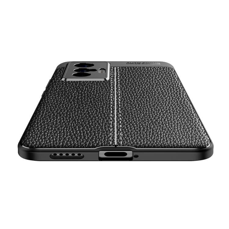 Black litchi-texture TPU phone case showing side ports and speaker cutout