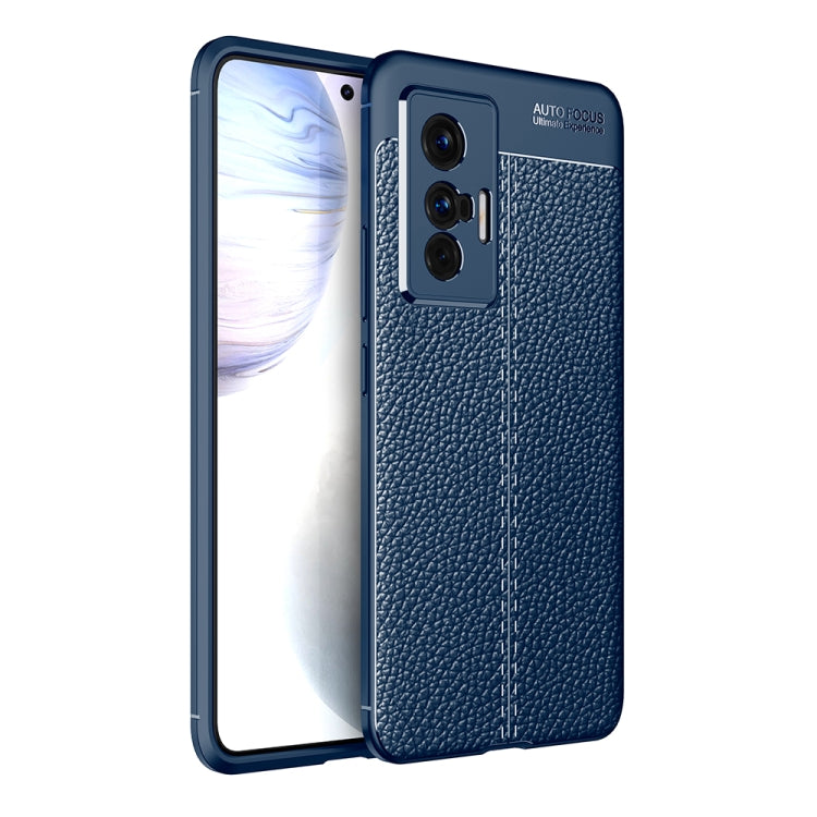 Blue litchi-texture TPU phone case with raised camera cutouts and shock protection