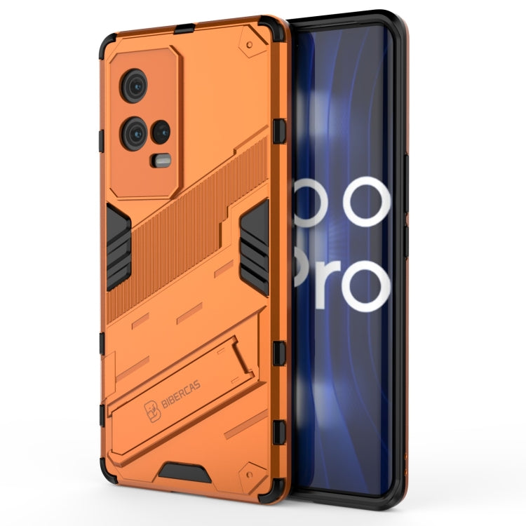 Rugged shockproof phone case with raised camera cutouts, orange armor style back