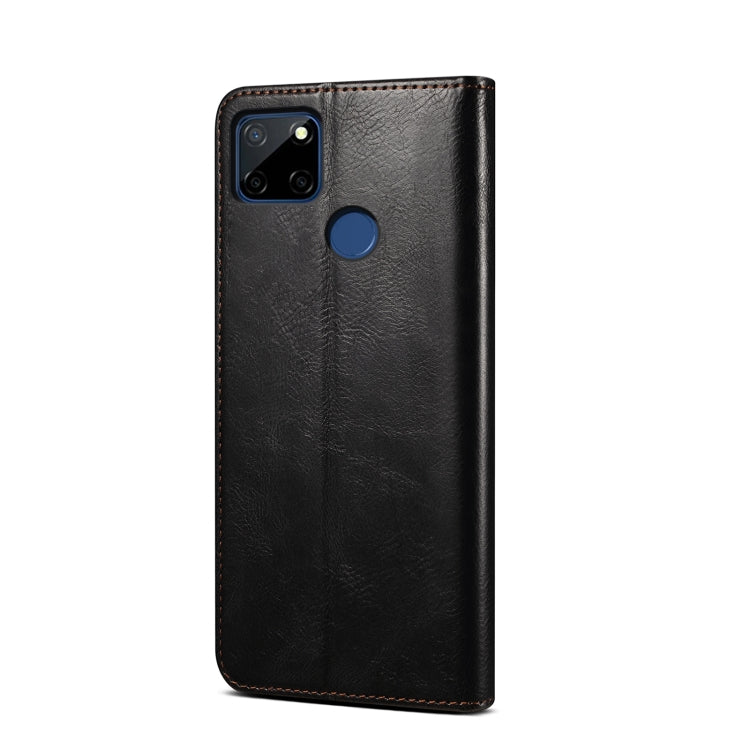 Black textured leather phone case with camera cutout and top card slot panel