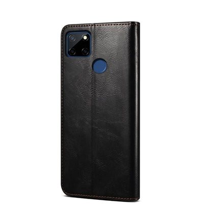 Black textured leather phone case with camera cutout and top card slot panel