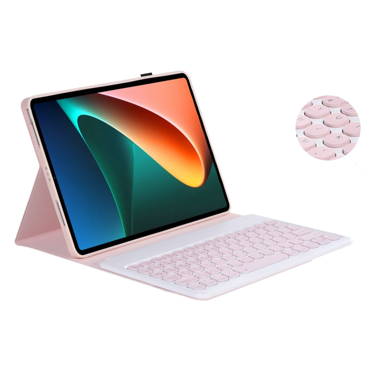 Keyboard case folio stand with round keycaps; circular keycap detail shows texture