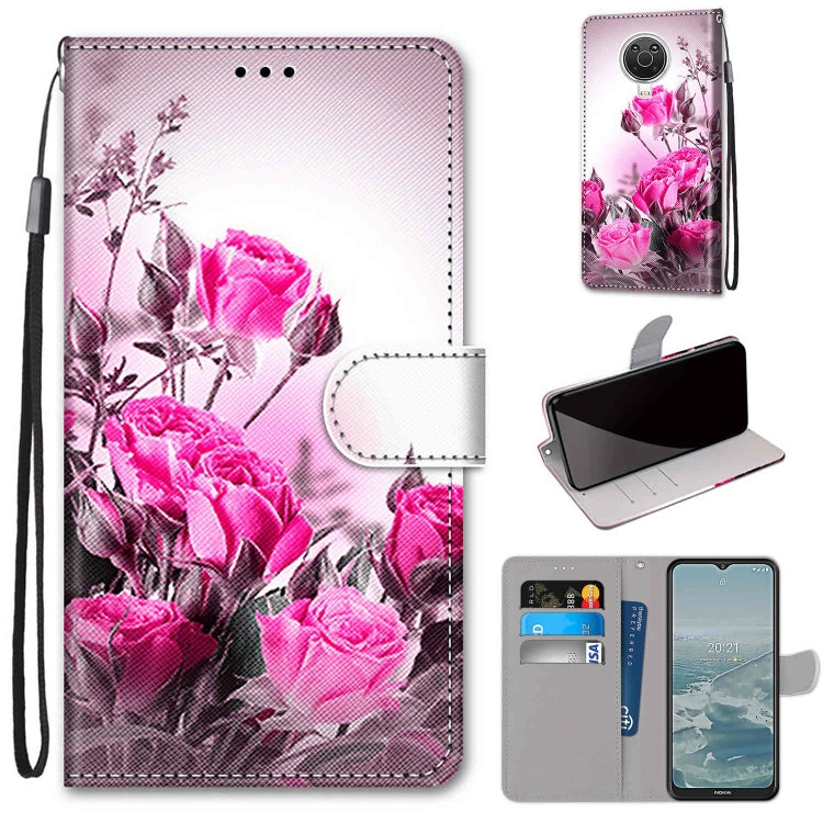 Phone wallet case with flip cover, card slots, and lanyard; pink rose bouquet print on PU.