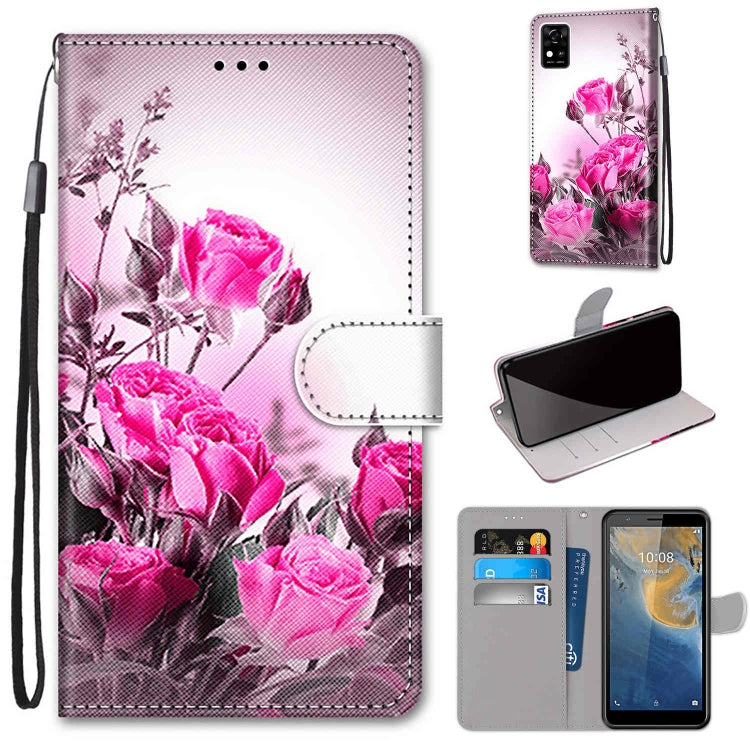 PU leather wallet phone case with card slots and lanyard, pink floral design.