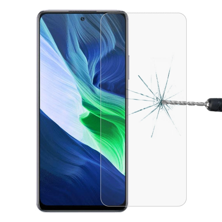 Tempered glass screen protector film applied to a smartphone front display