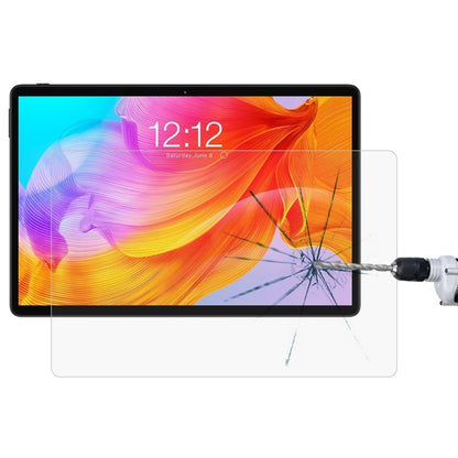 Tablet with clear tempered glass screen protector after impact test; display protected.