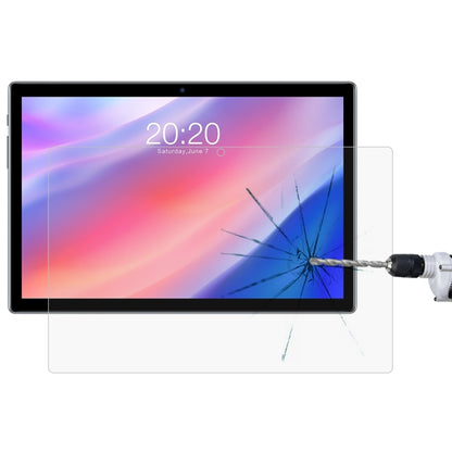 Tablet with clear tempered glass screen protector, display protected during impact test.