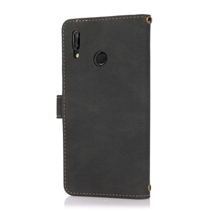 Black flip phone case with camera cutout, circular grip, and lanyard loop