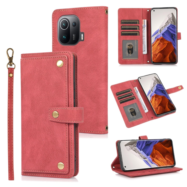 Red horizontal flip leather case with card slots, wallet pocket, and wrist lanyard