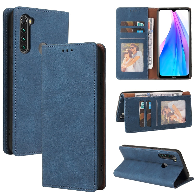 Blue leather wallet phone case with suction closure, card slots, and stand