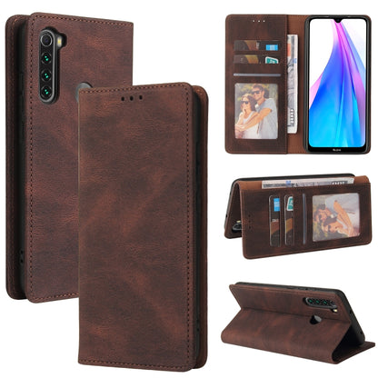Brown leather wallet phone case with suction closure, card slots, and stand