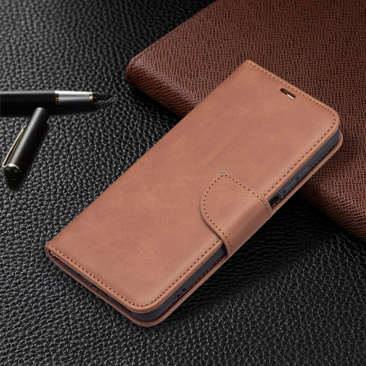 Brown PU leather flip phone case with stitched flap, slim profile