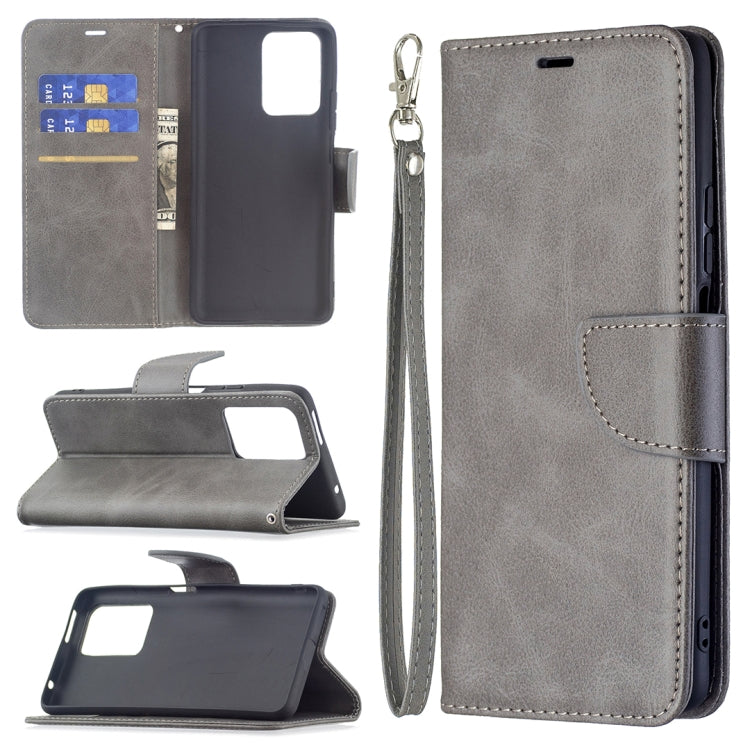 Dark gray flip wallet phone case with stand, card slots, and wrist lanyard