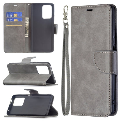 Dark gray flip wallet phone case with stand, card slots, and wrist lanyard