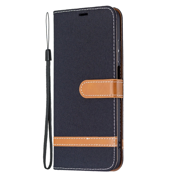 Denim texture phone wallet case with lanyard and tan stitched accents; dark blue
