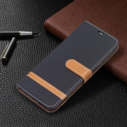 Denim texture wallet phone case with magnetic flap and tan stitched trim; dark blue