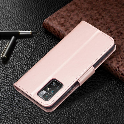 Pink leather phone wallet case with smooth front and camera cutout on back.