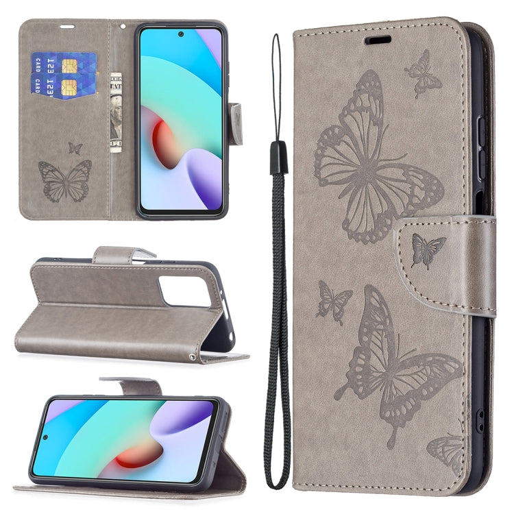 Gray leather flip phone wallet case with butterfly embossing, card slot, and lanyard.