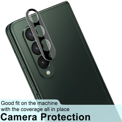 Integrated rear camera lens glass film with lens cap, black, fitted on phone