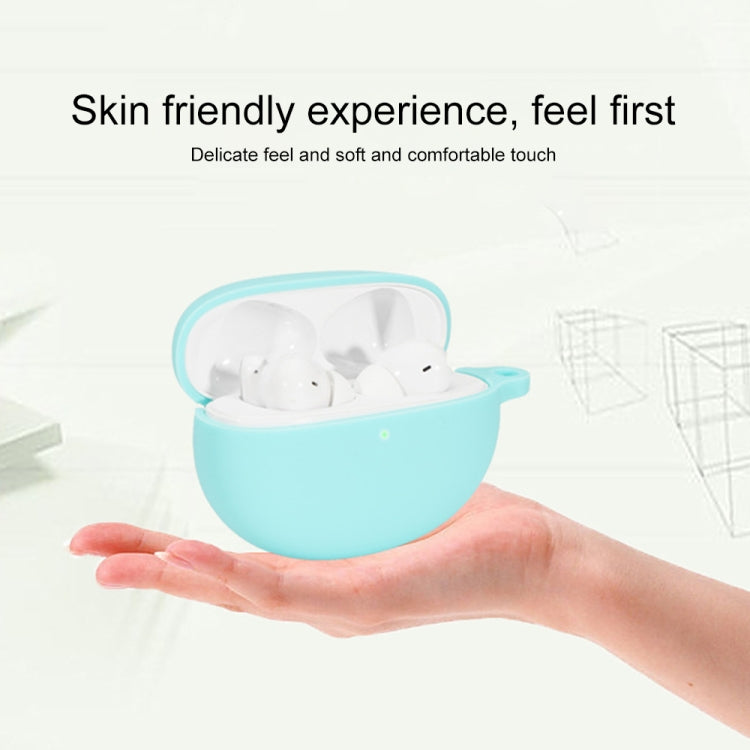 Light blue silicone earbud case with open lid and hand-held comfort