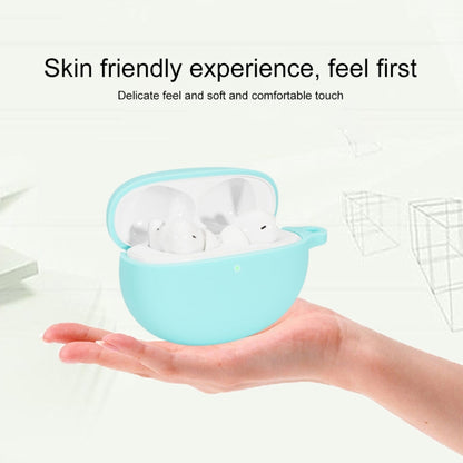 Light blue silicone earbud case with open lid and hand-held comfort
