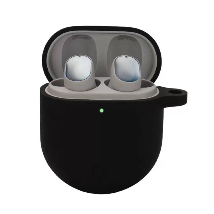 Black silicone earphone protective case for wireless earbuds, open-top holder.