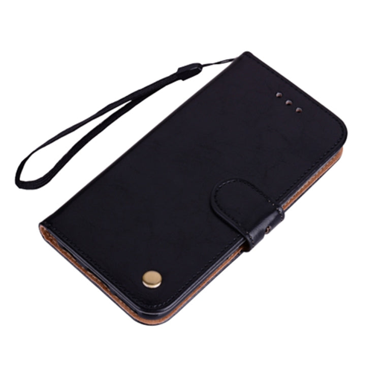 Black leather flip phone case with wrist strap and magnetic snap