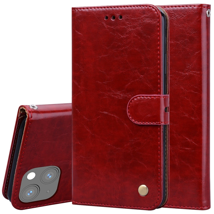 Red wallet-style flip leather phone case with folio strap and magnetic snap closure