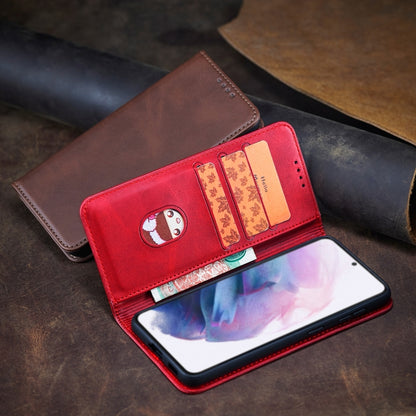 Brown and red leather wallet-style phone case with card slots and holder.