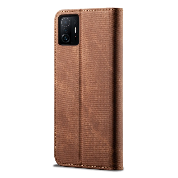 Brown flip leather phone wallet case with camera cutout and textured leather backing