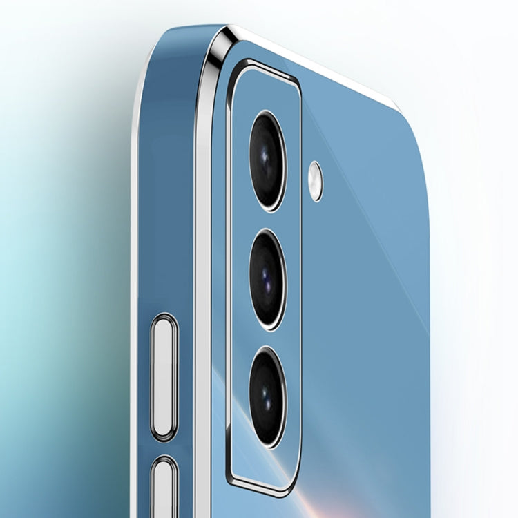 Blue electroplate TPU phone case with gold trim and camera cutouts