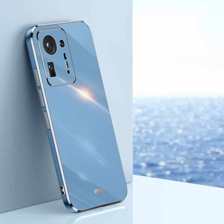 Celestial blue electroplated TPU phone case with gold trim, raised camera cutouts and side port openings