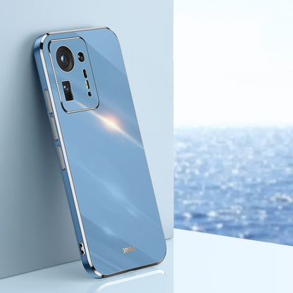 Celestial blue electroplated TPU phone case with gold trim, raised camera cutouts and side port openings