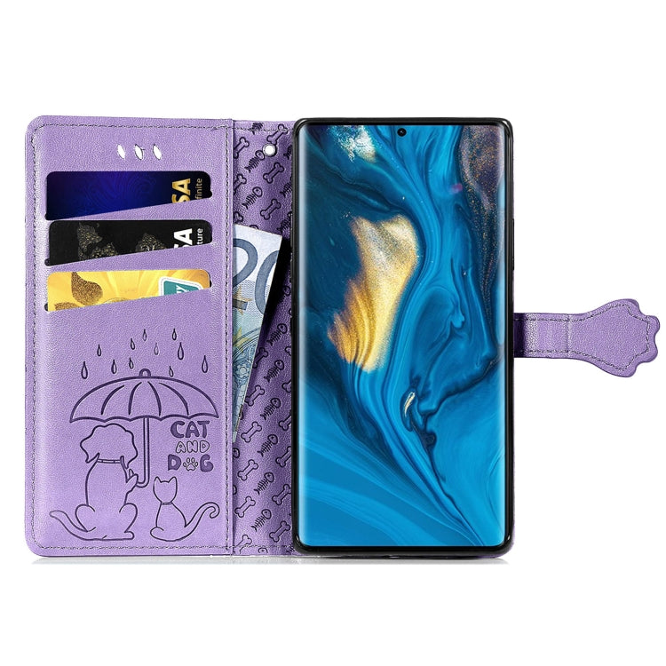 Purple embossed flip leather phone case with card slots, secured by a side strap