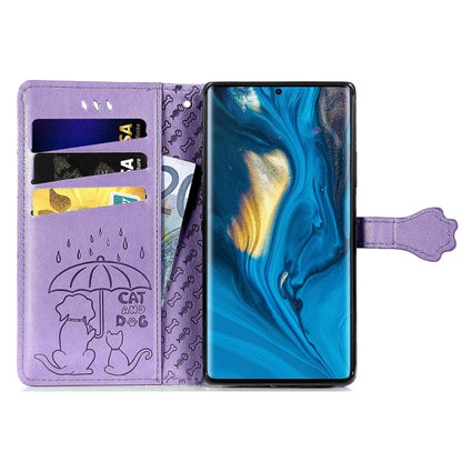 Purple embossed flip leather phone case with card slots, secured by a side strap