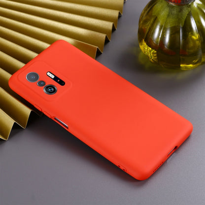 Red liquid silicone full-coverage phone case with camera and charging cutouts