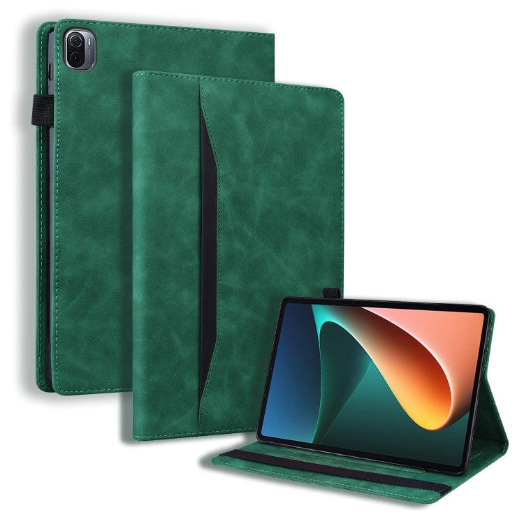 Green shockproof leather folio case holding tablet screen on a kickstand stand.