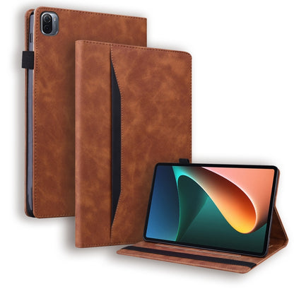 Brown leather folio tablet case with shock protection and standing viewing angle.