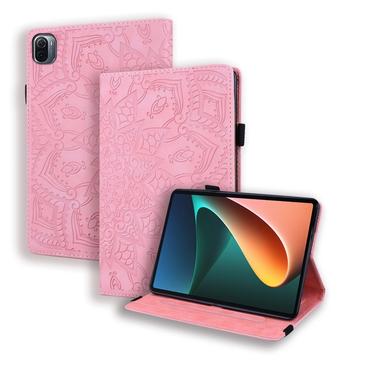 Pink embossed leather folio case with stand; patterned cover and elastic strap