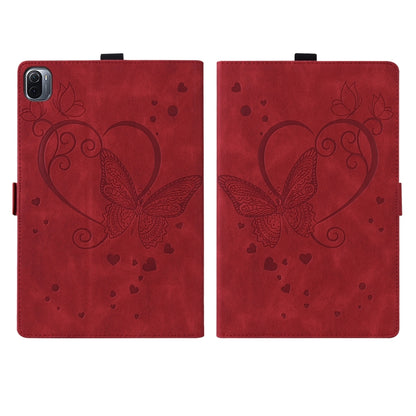 Red leather tablet flip case with embossed butterfly and heart pattern, two views