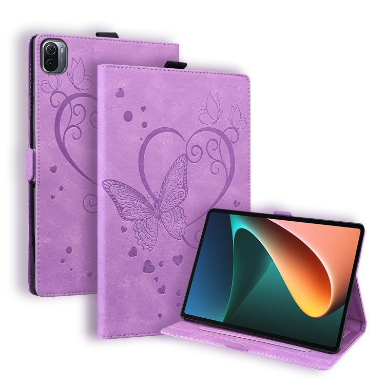 Purple leather tablet flip case with embossed butterfly-heart pattern and front stand