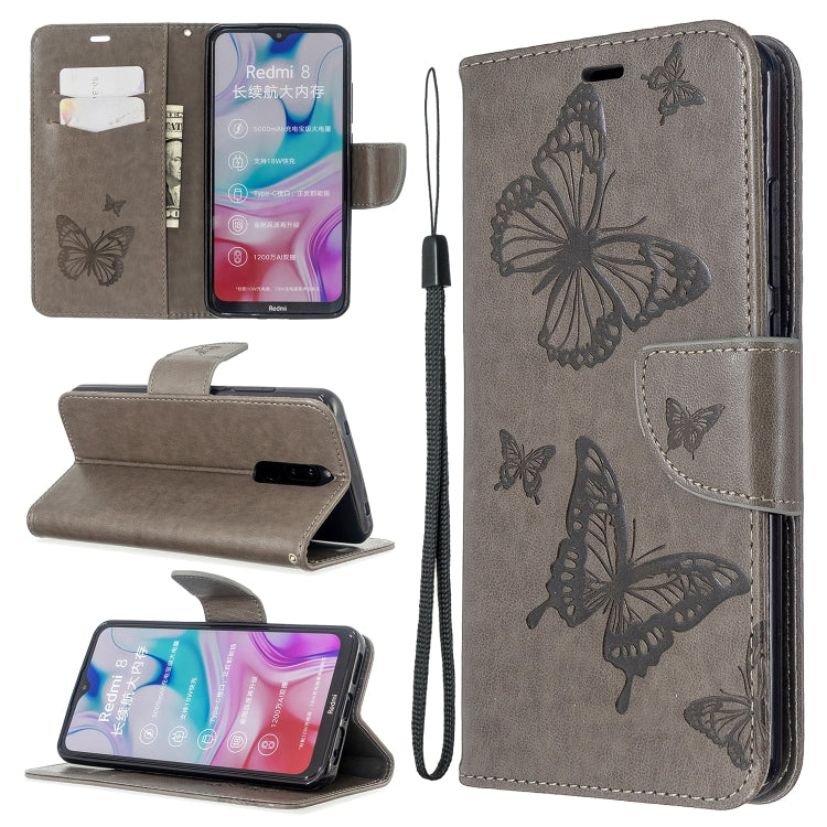 Gray butterfly embossed flip phone wallet case with card slot and lanyard strap
