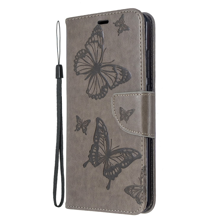 Gray butterfly embossed flip phone wallet case with card slot and lanyard strap