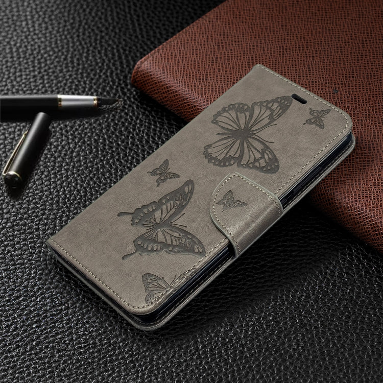 Gray butterfly embossed phone wallet case with card slot and fold-over cover