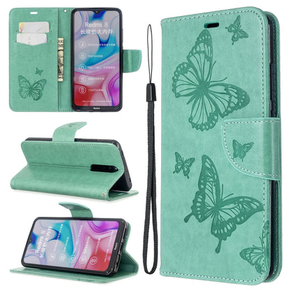 Green butterfly embossed flip phone wallet case with card slot and lanyard strap