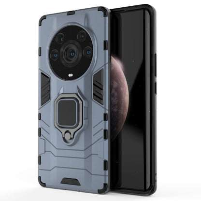 Navy blue rugged phone case with magnetic ring holder and camera cutouts