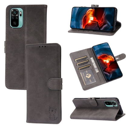 Grey leather flip phone case with embossed cat, card slots, and viewing holder